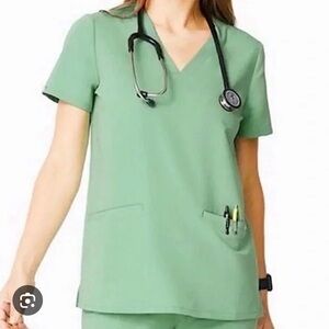 Figs women’s Casma 3 pocket jade scrub top size medium